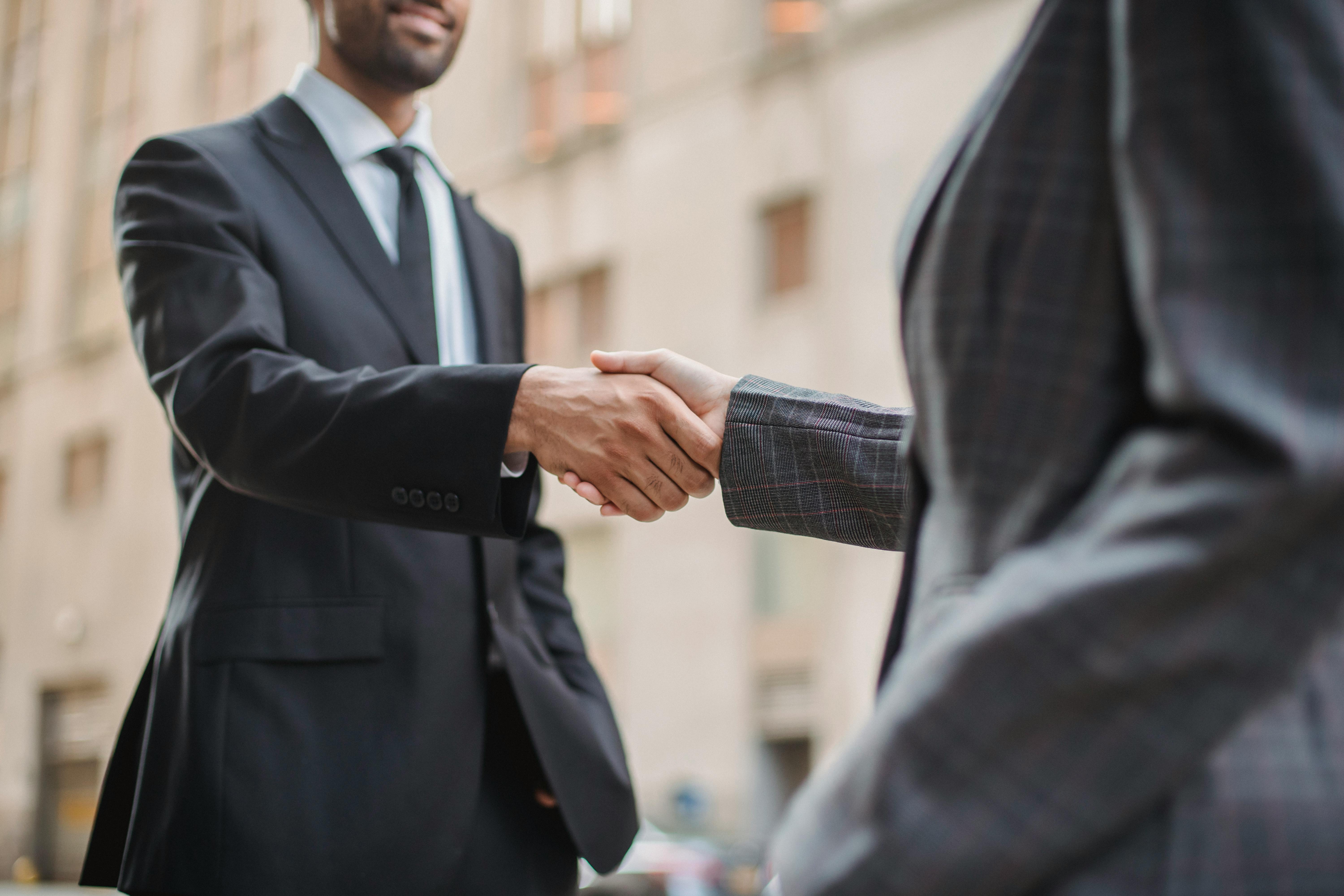 Business handshake deal